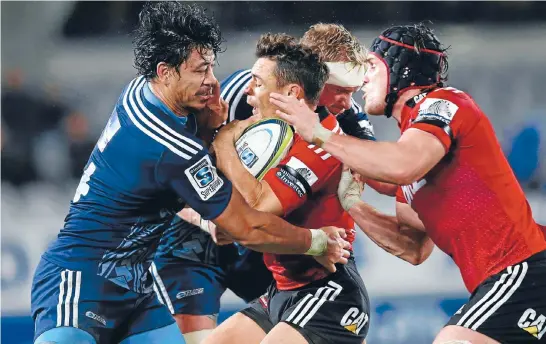  ?? Photo: GETTY IMAGES ?? Dan Carter, middle, is back in the thick of the action at No10 and still themanfor the All Blacks in Rugby World Cup year.