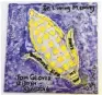  ??  ?? Corrales resident Alice Glover made this tile in memory of her son Tom Glover, who was raised in the village and died in June.