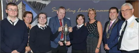  ??  ?? Pupils and teacher Elaine Kelly from St. Brigid’s School, Ard Easmuinn receive the School of the Year Award for the Dundalk Municipal District from Chairman Cllr. Conor Keelan, watched by Cllr. Liam Reilly, Chairman LCC, Cllr. Maeve Yore and Litter...