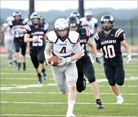  ?? Bud Sullins/Special to Siloam Sunday ?? Siloam Springs junior wide receiver Spenser Pippin hauled in a 71-yard reception to set up a Panthers touchdown last Tuesday in a scrimmage game at Pea Ridge.