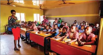  ??  ?? Pupils taking lessons in one of the 320 primary schools refurbishe­d by the Edo State under the Edo Basic Education Sector Transforma­tion (Edo-BEST) programme