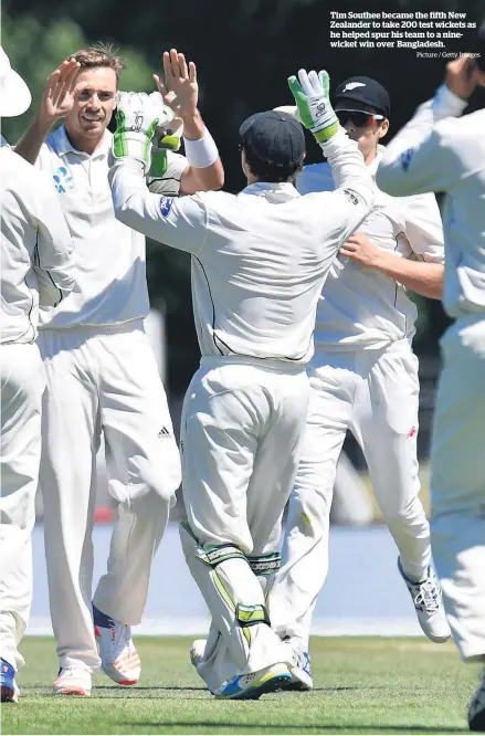  ?? Picture / Getty Images ?? Tim Southee became the fifth New Zealander to take 200 test wickets as he helped spur his team to a ninewicket win over Bangladesh.