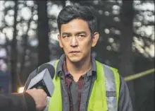  ?? Elizabeth Kitchens ?? John Cho’s facial expression­s help move the story along in the thriller “Searching.”