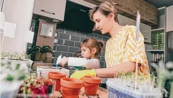  ?? Shuttersto­ck ?? You really can grow an amazing amount of food — like peppers, cucumbers, tomatoes and all kinds of herbs — in a pot or two.