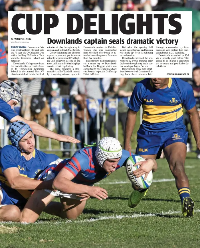  ?? Photo: Nev Madsen ?? GAME WINNER: Downlands captain Mac Grealy scores the winning try. Downlands 27-21 victory bought an end to Grammar’s five game O'Callaghan Cup winning streak.