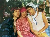  ??  ?? Bottom
Lady Anne on Mustique in the mid’80s with Mick Jagger and Rupert Everett