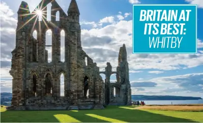  ??  ?? Gothic splendour: The ruins of Whitby Abbey overlookin­g the North Yorkshire coast