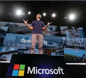  ?? AP ?? Microsoft chief executive Satya Nadella speaks in May at the company’s software conference in Seattle. Nadella has centered a new strategy on cloud services to compete with market leader Amazon.