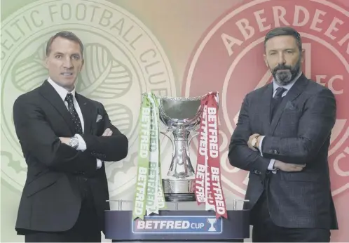  ??  ?? Aberdeen manager Derek Mcinnes, right, is facing Celtic counterpar­t Brendan Rodgers in a cup final for the third time.