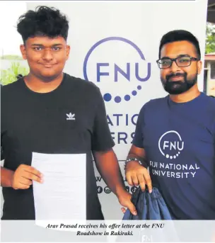  ?? ?? Arav Prasad receives his offer letter at the FNU Roadshow in Rakiraki.