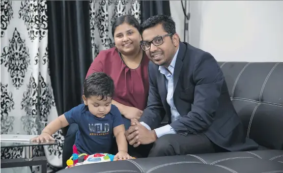  ?? DON MOLYNEAUX ?? Sam Mathew and Blessy Cherian with their son Jayden in their new Urban Townhome by Mattamy Homes in Cityscape.