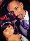  ?? CONTRIBUTE­D ?? Brandon Cooper (shown here with his wife, Brittney Cooper) was shot and killed while driving for Lyft.