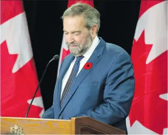  ?? JUSTIN TANG/ THE CANADIAN PRESS ?? NDP Leader Tom Mulcair told the party’s caucus on Wednesday that he wants “an unvarnishe­d, open, complete look” at what went wrong for the party in last month’s federal election.