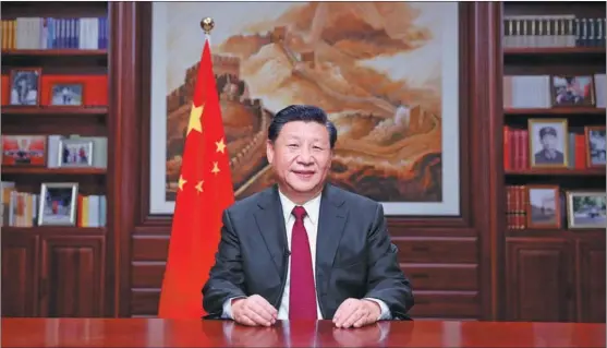  ?? JU PENG / XINHUA ?? President Xi Jinping delivers his New Year’s speech from his office in Beijing. Xi highlighte­d the steady progress of China’s high-quality developmen­t in 2019 and extended his New Year’s wishes for 2020.
