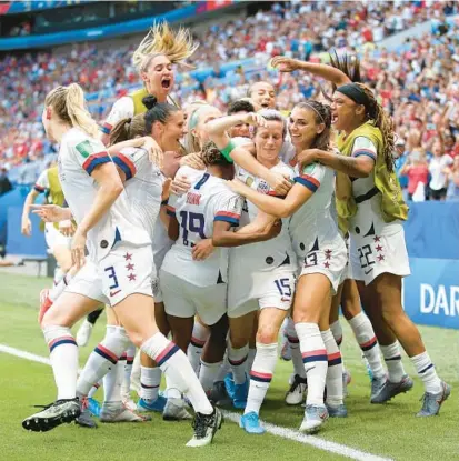  ?? GETTY FILE ?? While the U.S. women’s soccer team reached a historic agreement for equal pay with the men’s team, the possibilit­y for the same in many other countries faces resistance. The disparity between prize money at the men’s and women’s World Cups remains the biggest obstacle.