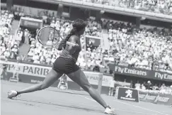  ?? AP PHOTO/THIBAULT CAMU ?? Sloane Stephens returns the ball to Simona Halep during their match Saturday.