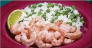  ?? LINDA GASSENHEIM­ER/TNS ?? Shrimp with Coconut Rice.