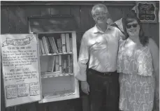  ?? CITIZEN STAFF PHOTO ?? Mayor Lyn Hall and Jessic Bonin attended the opening of the Free Little Library, located at 10th Avenue and McBride Crescent.