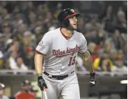  ?? Denis Poroy / Getty Images ?? The Nationals’ Matt Adams watches his home run in the seventh inning, his second of the night.