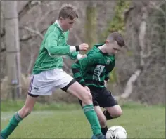  ??  ?? Reuben Lafferty of Forth Celtic nicks the ball away from Gorey Celtic’s Ryan Callaghan.