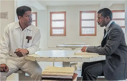  ?? WARNER BROS. PICTURES ?? Jamie Foxx, left, and Michael B. Jordan in “Just Mercy,” the story of how a young lawyer beat death row in southern United States.