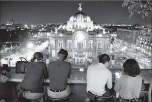  ??  ?? A view from the Sears building of the Palacio de Bellas Artes in Mexico City.