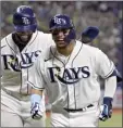  ?? AP photo ?? Isaac Paredes of the Rays celebrates with Yandy Diaz after hitting a two-run homer in the fifth inning Tuesday.