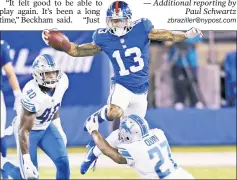  ?? Anthony J. Causi ?? BECK’ & CALL: Odell Beckham hurdles Lions safety Glover Quin on Monday night. Beckham ended the night with four catches for 36 yards in a 24-10 loss to the Lions.