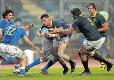  ?? /Gabriele Maltinti/Gallo Images ?? Forging ahead: Jesse Kriel takes on the Italy defence with back-up from Lood de Jager, No 5, and Bok captain Eben Etzebeth in the 35-6 win over the Azzurri in Padua on Saturday.