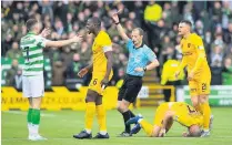  ??  ?? LITTLE MAN IN MIDDLE Willie Collum sends Ryan Christie off