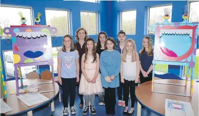  ?? PHOTO COURTESY OF TOWN OF ST-LAZARE ?? St-Lazare recently unveiled its new Croque-livres book boxes, which were decorated by art students under the direction of Marie-Eve Longtin, above, second from left.