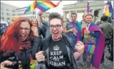  ?? REUTERS ?? People celebrate Germany's parliament legalising samesex marriage in front of the Brandenbur­g Gate in Berlin.