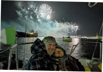  ??  ?? Natasha Devereux says of her picture (left): ‘I took this picture of my parents on their boat Seagrace the night of the fireworks. It was a really special moment as it was their first time viewing the fireworks from the boat after two years of hard work getting her seaworthy.’
