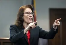  ?? STEPHEN b. MORTON / fr56856 ap POOL ?? Prosecutor linda dunikoski presents a closing argument to the jury during the trial of Travis mcmichael, his father, Gregory mcmichael, and William ‘Roddie’ bryan, at the Glynn County Courthouse on monday in brunswick, Ga. The three men are charged with the february 2020 slaying of 25-year-old ahmaud arbery.