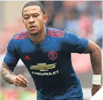  ??  ?? ■
Memphis Depay is hoping for a better season.