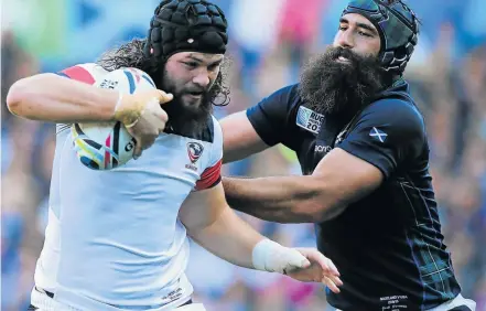  ?? Picture: GETTY IMAGES ?? BEARDED WONDER: Scotland’s Josh Strauss gets a grip on Daniel Barrett of the USA during the World Cup Pool B match between the nations in Leeds. Strauss may be a key factor against the Boks today
