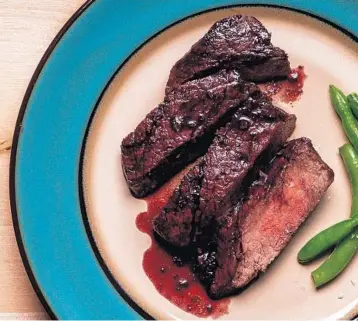  ??  ?? Beef tenderloin should be steamed for about eight minutes to medium-rare and finished with a port-wine reduction.