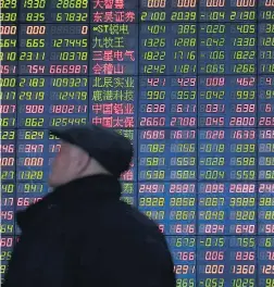  ?? ALY SONG / REUTERS ?? Cenário. Os mercados financeiro­s na China estão se debatendo