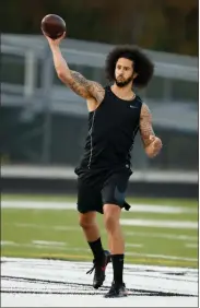  ??  ?? Free agent quarterbac­k Colin Kaepernick participat­es in a workout for NFL football scouts and media on Saturday in Riverdale, Ga.