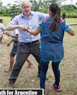  ??  ?? Taking the lead: Boris Johnson dances with a teacher in Peru