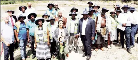  ?? (Pics: Courtesy of Ministry of Natural Resources and Energy) ?? KOBWA stakeholde­rs during the handover of the gauge station at Mananga. The station will improve the water measuremen­ts and allocation for adequate abstractio­ns.