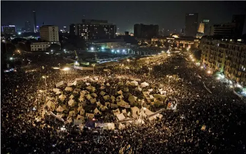  ??  ?? THRESHOLD OF LIBERTY Protesters in Cairo’s Tahrir Square during demonstrat­ions against Egyptian President Mohammed Morsi in November 2012.