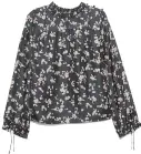  ??  ?? Floral prints are a fun option for fall. Wilfred Lourdes blouse in black is available at Aritzia for $195.