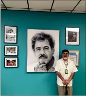  ?? COURTESY IRENE MONICA SANCHEZ ?? Civil rights leader Bobby Lee Verdugo stands in front of a portrait of Chicano Movement leader Rodolfo “Corky” Gonzales at Escuela Tlatelolco in Denver, Colo., in April 2016.