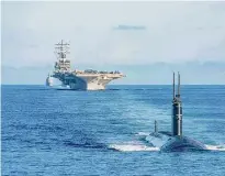  ?? Petty Officer 3rd Class Gray Gib/USS Ronald Reagan ?? In December, the U.S. Department of Defense awarded $5.1 billion toward constructi­on of the first two Columbia-class submarines.