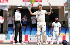  ?? ?? England’s captain Joe Root celebrates after he scored a century