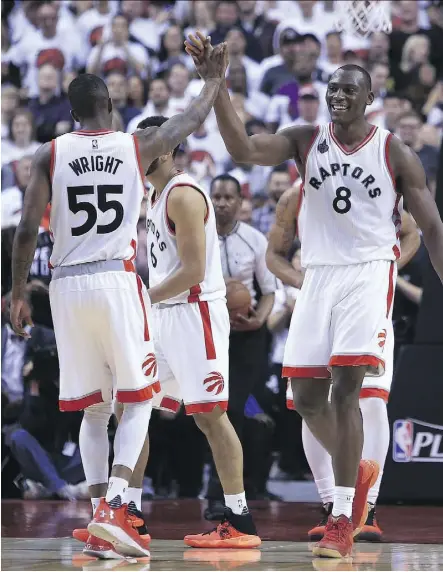  ?? VAUGHN RIDLEY/GETTY IMAGES ?? Bismack Biyombo and the Toronto Raptors, seen here in their Game 7 victory over the Miami Heat on Sunday, are trending upward in national TV ratings. The entire country is beginning to take notice of the Raptors now that they’re one of the NBA’s final...