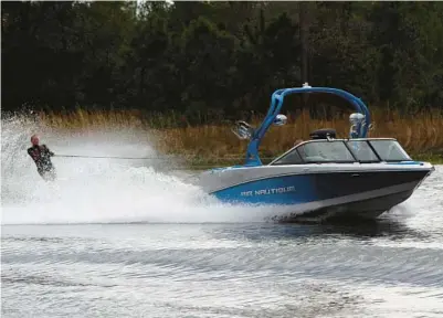  ?? RICARDO RAMIREZ BUXEDA/ORLANDO SENTINEL ?? Orlando-based Correct Craft makes Nautique boats, used for wakeboardi­ng and waterskiin­g.