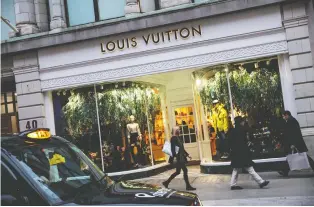  ?? JACK TAYLOR/ GETTY IMAGES ?? “The luxury players that are doing well are the ones who have played the ultimate card of luxury ... customizat­ion is part of that uber luxury,” says Louis Vuitton CEO Michael Burke.