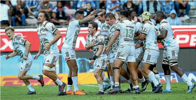  ?? GETTY IMAGES ?? Chiefs players celebrate during their crucial win over the Stormers in Cape Town which kept them in the mix in the tightly contested New Zealand conference.